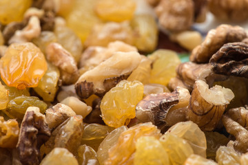 raisins and walnuts closeup background
