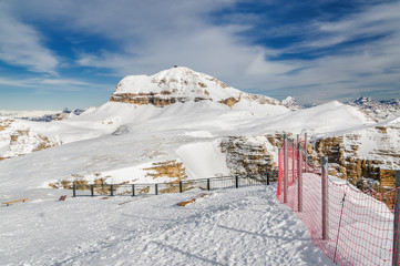 Sunny view of Dolomite Alps from viewpoint of Passo Pordoi near Canazei of Val di Fassa, Trentino-Alto-Adige region, Italy.