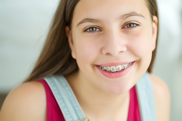 Girl with braces  - 137896273