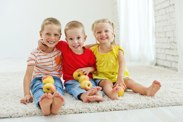 Children with fruit at home 