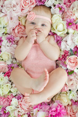 Little baby and flowers 