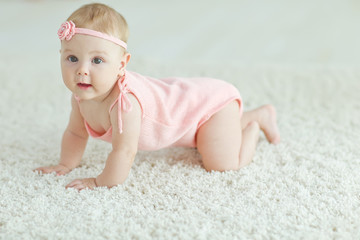 The child learns to crawl 