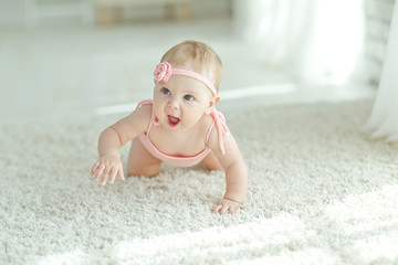 The child learns to crawl 
