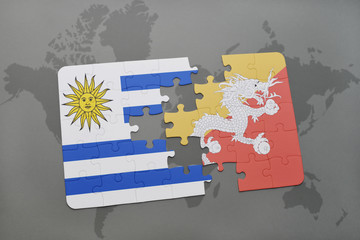 puzzle with the national flag of uruguay and bhutan on a world map