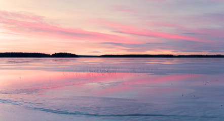 Sunset lake in winter
