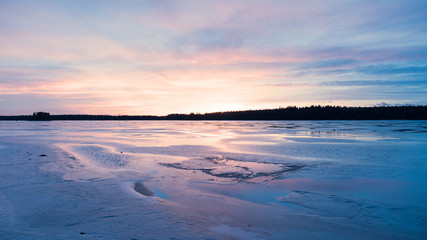 Sunset lake in winter
