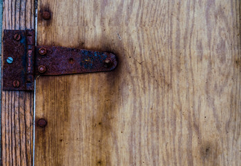 Wood texture. Metal elements on the wooden texture. The background of the wooden planks.