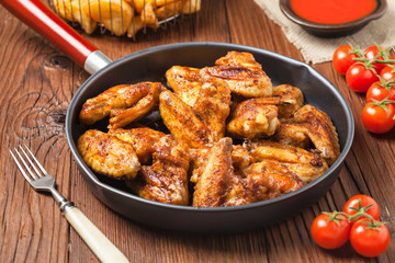 Baked wings, served with dip or baked potatoes.