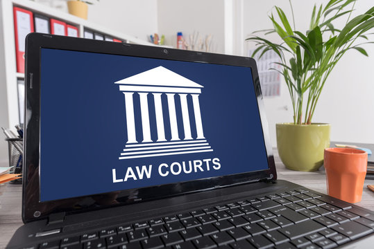 Law courts concept on a laptop
