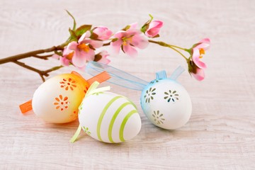 Easter eggs and blossom branch.