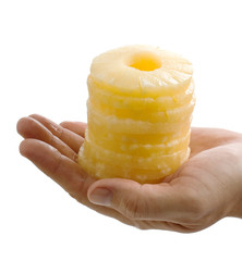 slices of pineapple in the palm