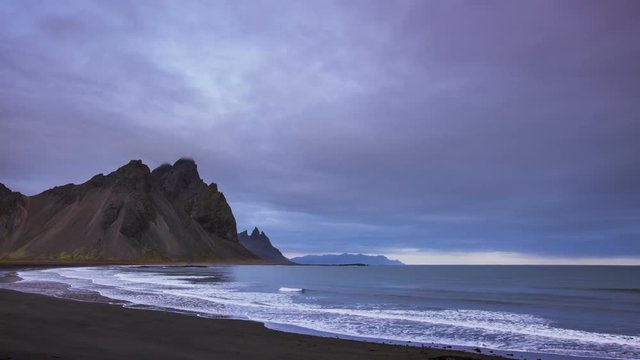 Time Lapse - Black Sand beach of the coastline with mountains in Iceland