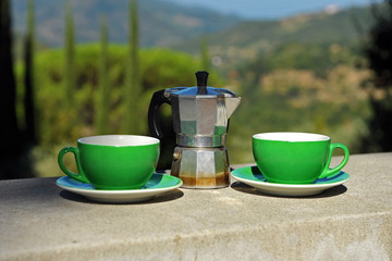 Italian breakfast with cappuccino. Tuscan landscape 