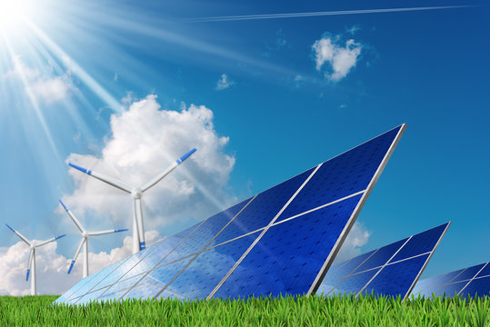 Solar panels and wind turbines on a blue sky with clouds