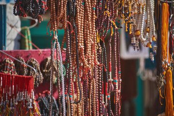 Tibetan handcrafted beads for sale hanging at the street market