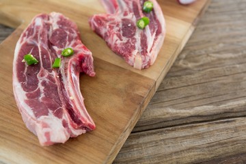 Sirloin chop on wooden tray
