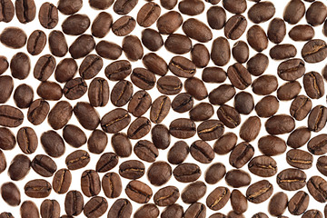 Roasted coffee beans pattern isolated on white background.
