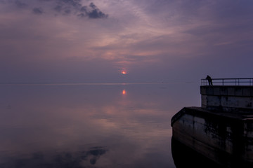 Lonely man with Sunset