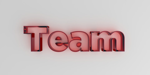 Team - Red glass text on white background - 3D rendered royalty free stock image.