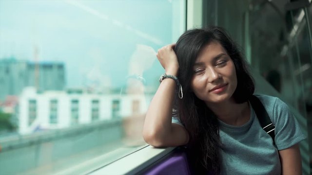 Beautiful girl travelling in underground