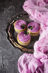 Homemade mini tarts with fresh berries currant pink cream and blackberries