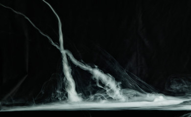 Vape trick tornado on a dark background