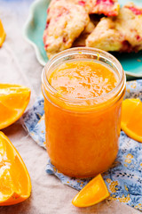 Fototapeta na wymiar Orange jam in glass jar.selective focus