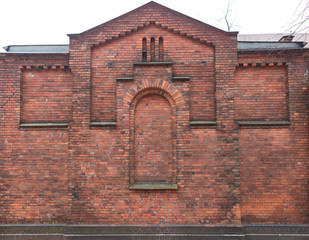 Old Red Brick Building Facade without Windows