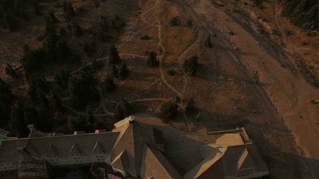 Mt Hood Aerial v2 Flying low over lodge panning up to mountain view.