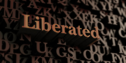 Liberated - Wooden 3D rendered letters/message.  Can be used for an online banner ad or a print postcard.