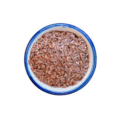 Brown flax seed in bowl on white. This has clipping path.