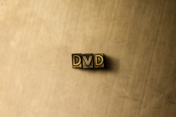 DVD - close-up of grungy vintage typeset word on metal backdrop. Royalty free stock illustration.  Can be used for online banner ads and direct mail.