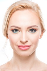 Obraz premium Close-up portrait of gorgeous young blonde woman smiling at camera, skincare concept