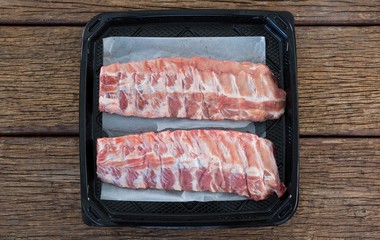 Beef ribs in black box