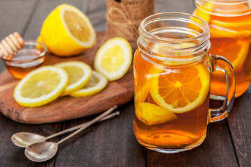 Hot tea with lemon and natural honey, good treat to have vitamins and strong immunity.