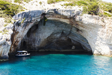 Fototapeta premium motor boat in blue caves on Zakynthos island in Greece, Europe