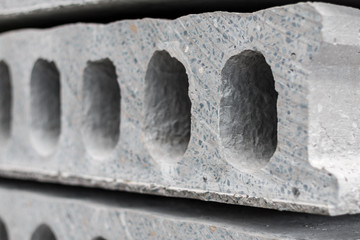 Reinforced concrete product with holes