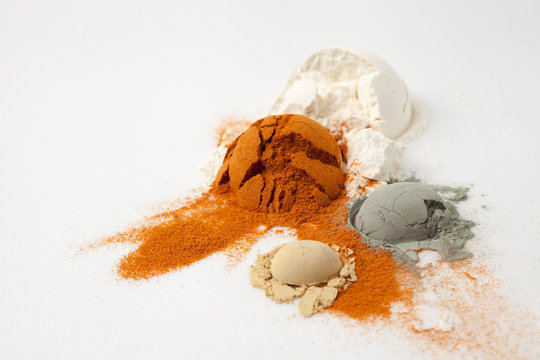 hemisphere of powder is split and cracked, flour, ground pepper, mustard, green clay in recipes cosmetics