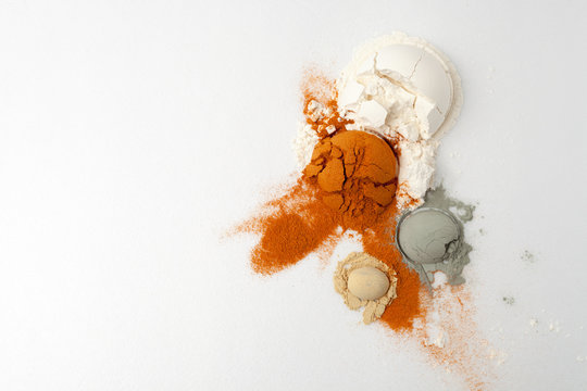 hemisphere of powder is split and cracked, flour, ground pepper, mustard, green clay in recipes cosmetics