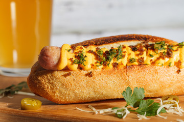 Hot dog with beer