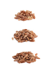 Pile of brown rice grains isolated