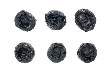 dried prunes isolated on white