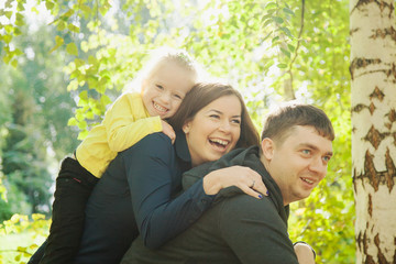 Beutiful family enjoying time toether, have fun outdoors