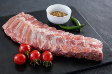 Beef ribs, cherry tomatoes and coriander seeds