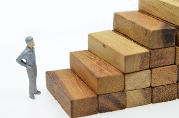 Way to success with  businessman and wood block step