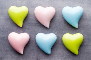 Colored heart on the gray background.