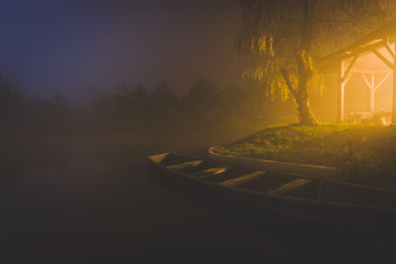 a boat in yellow light after sunset