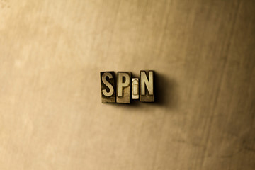 SPIN - close-up of grungy vintage typeset word on metal backdrop. Royalty free stock illustration.  Can be used for online banner ads and direct mail.