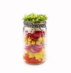 Salad in a jar. Healthy Homemade Mason Jar Salad. The concept of healthy proper nutrition for the whole family.