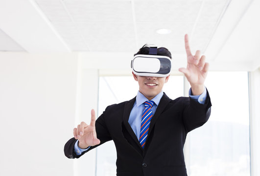 young Businessman wearing vrl glass at office